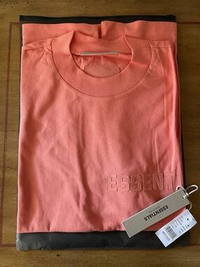Essentials Coral Pink Embossed Logo Crewneck Sweatshirt